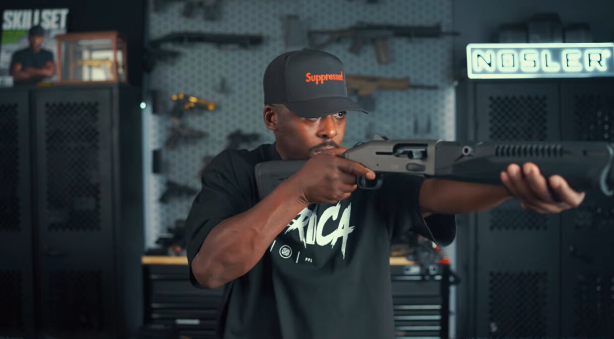 Colion Noir shouldering Mossberg 990 SPX