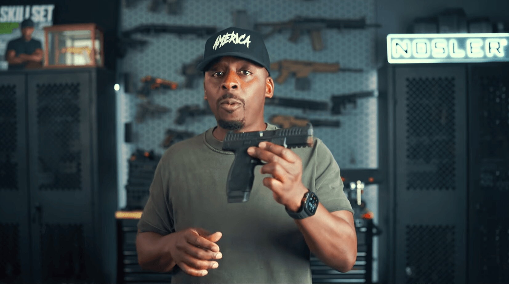 Colion Noir holding CZ Duty pistol