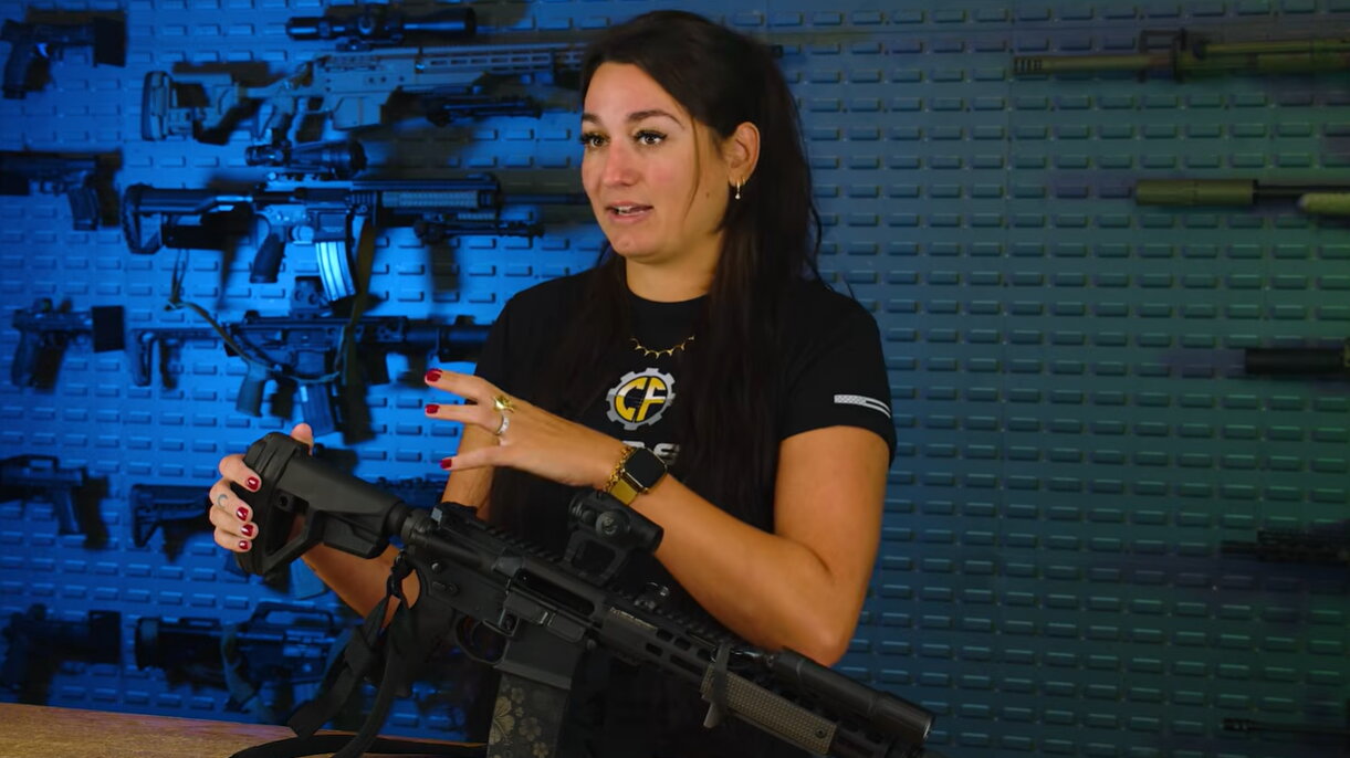 Host holding Griffin Armament MK2 pistol
